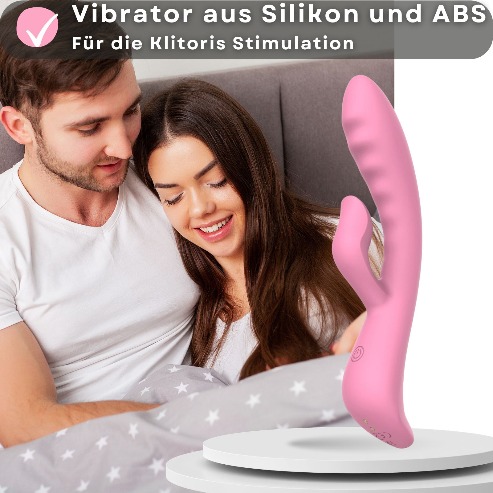 Rosa Vibrator mit Hasenohren. Aus Silikon und ABS. Paar im Hintergrund. Auf weißer Oberfläche.