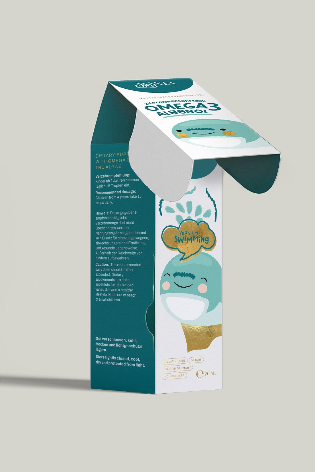 Geöffnete Verpackung mit Cartoon-Wal-Illustration und Aufschrift: Omega3 Algenöl. Text über Dosierung.