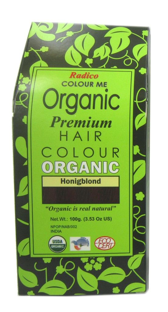 Verpackung von Radico Colour Me Organic Pflanzenhaarfarbe Honigblond. Grün-schwarzes Design mit Produktnamen und Zertifizierungen.