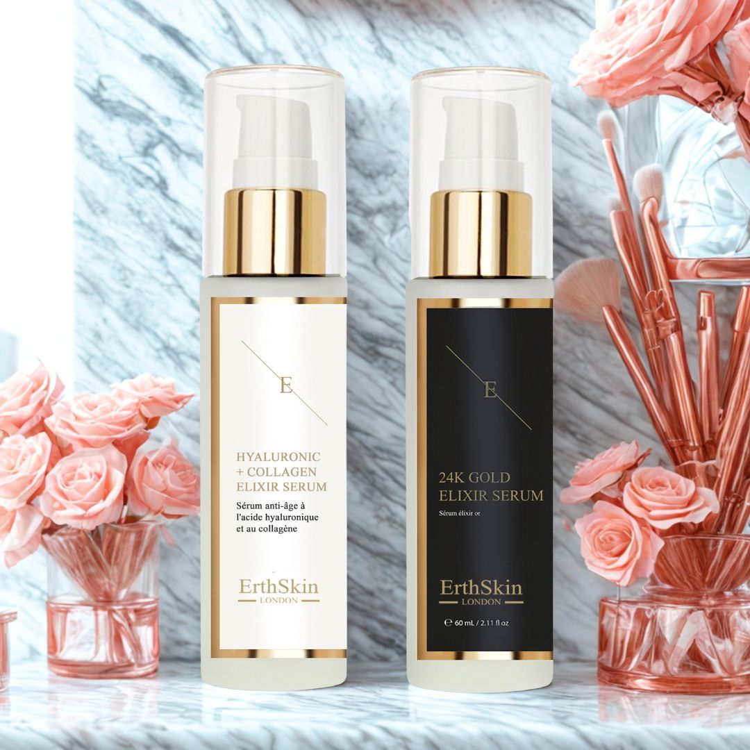 Zwei Serumflaschen mit goldenen Akzenten, neben Rosen und Make-up-Pinsel. Eine weiße Flasche mit "Hyaluron + Collagen". Eine schwarze Flasche mit "24K Gold".