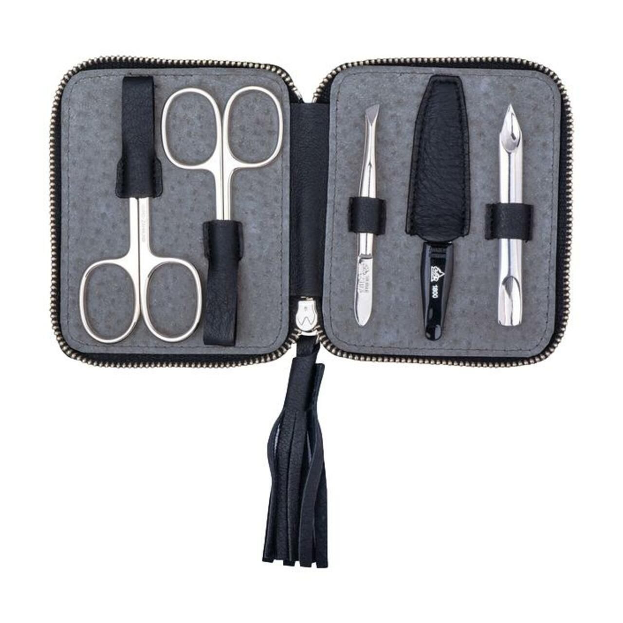 5-teiliges Maniküre-Etui aus schwarzem Leder mit Schere, Pinzette, Nagelhautschieber und Nagelknipser.