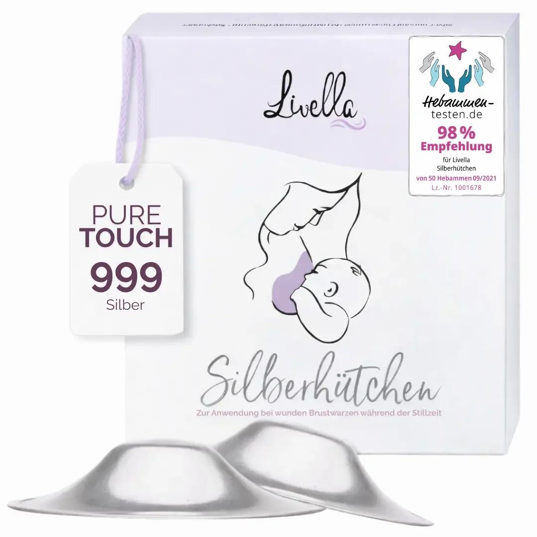 Verpackung mit zwei silberfarbenen Brustwarzenhütchen. Text: Livella, PureTouch, Silberhütchen. Empfehlung 98%.