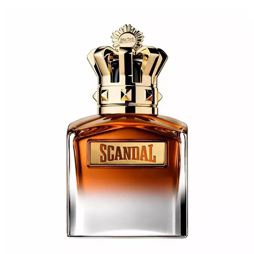 Parfumflakon mit goldfarbenem Kronenverschluss. Aufschrift "SCANDAL" auf einem rechteckigen Etikett. Farbverlauf von braun zu klar.