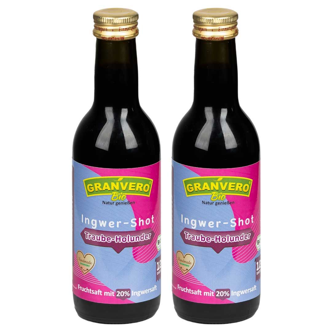 Zwei Flaschen GRANVERO® Bio Ingwer Shot Traube-Holunder. Etikett mit Produktinformationen und Logo.