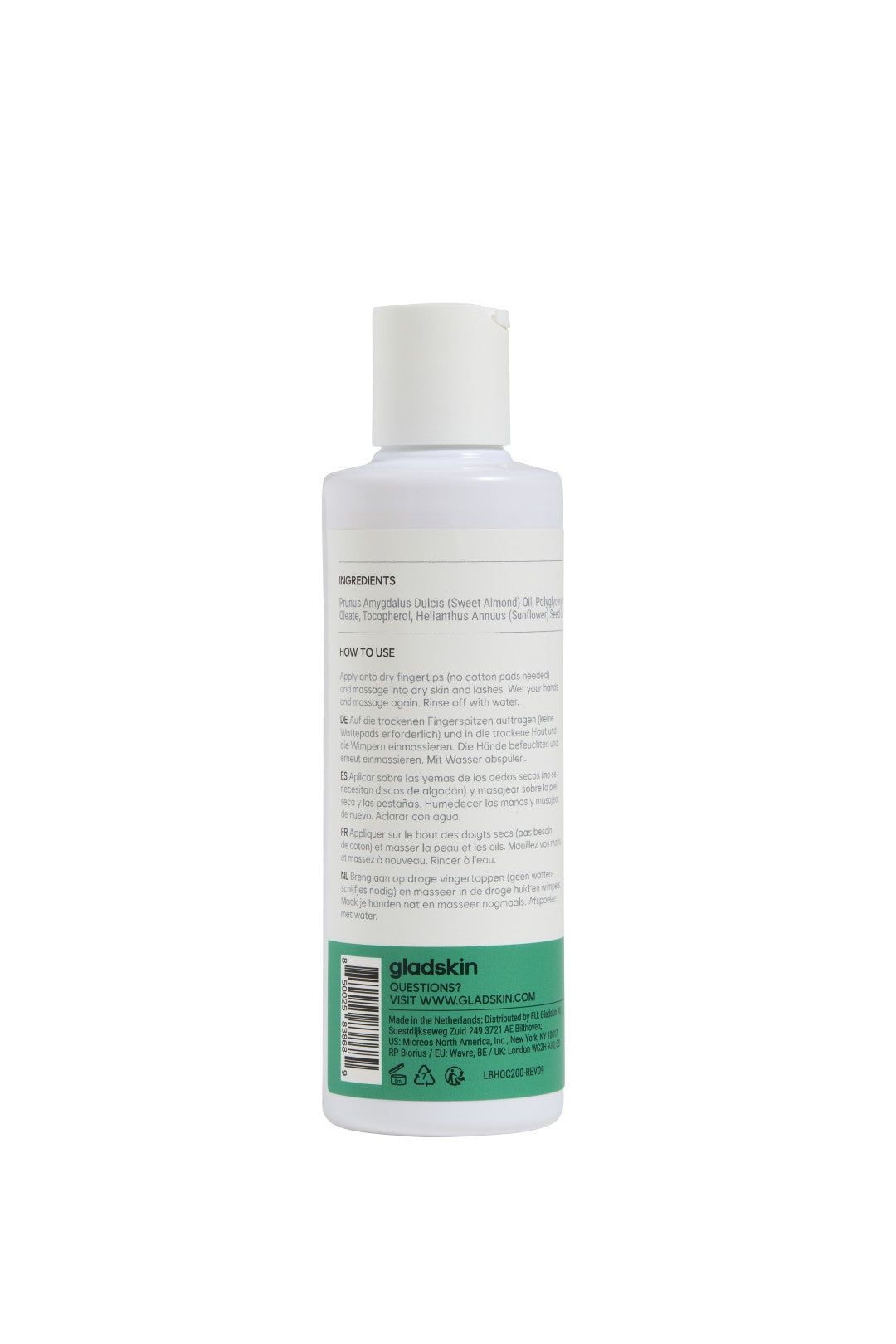 Rückseite einer weißen Flasche. Text mit Inhaltsstoffen und Anwendungshinweisen. Grüner Streifen unten.