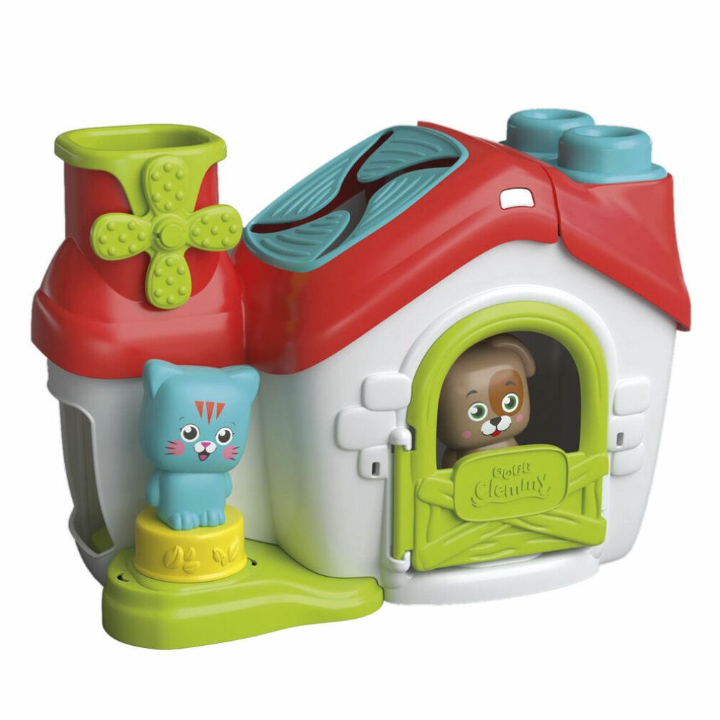 Rotes Spielhaus mit grünen Elementen. Katze und Hundefigur. Windrad und Dachfenster. Clemmy Sensory Farm.