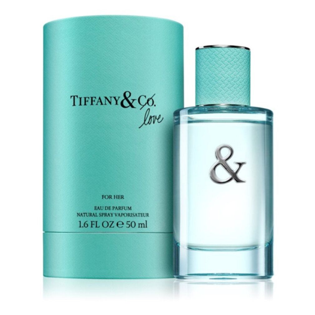 Türkisfarbener Zylinder und rechteckige Glasflasche mit türkisfarbenem Deckel. Aufschrift: Tiffany & Co. Love. Eau de Parfum.