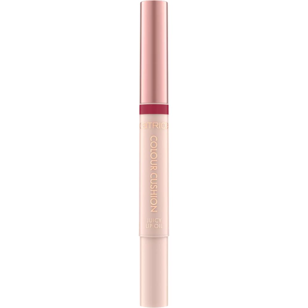 Ein Lippenstift mit roségoldfarbenem Deckel und hellrosa Schaft. Der Schaft ist mit 'COLOUR CUSHION JUICY LIP OIL' beschriftet.