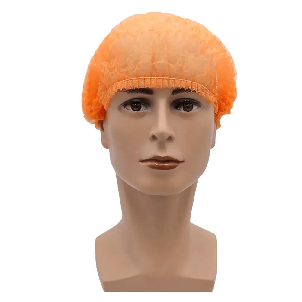 Orangefarbene Klipphaube auf einem Schaufensterpuppenkopf. Die Haube hat eine gerüschte Kante.