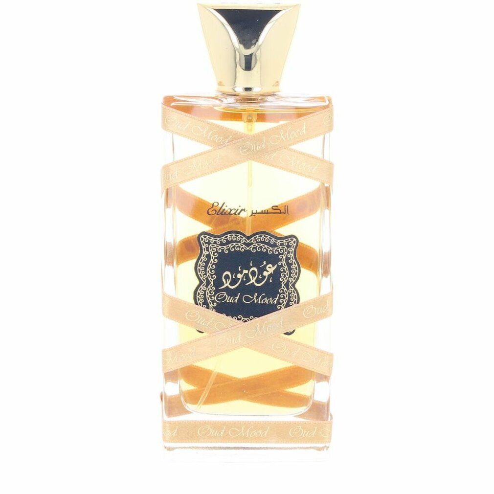 Parfümflasche mit goldener Kappe und brauner Flüssigkeit. Goldfarbene Bänder mit arabischer Schrift um die Flasche.