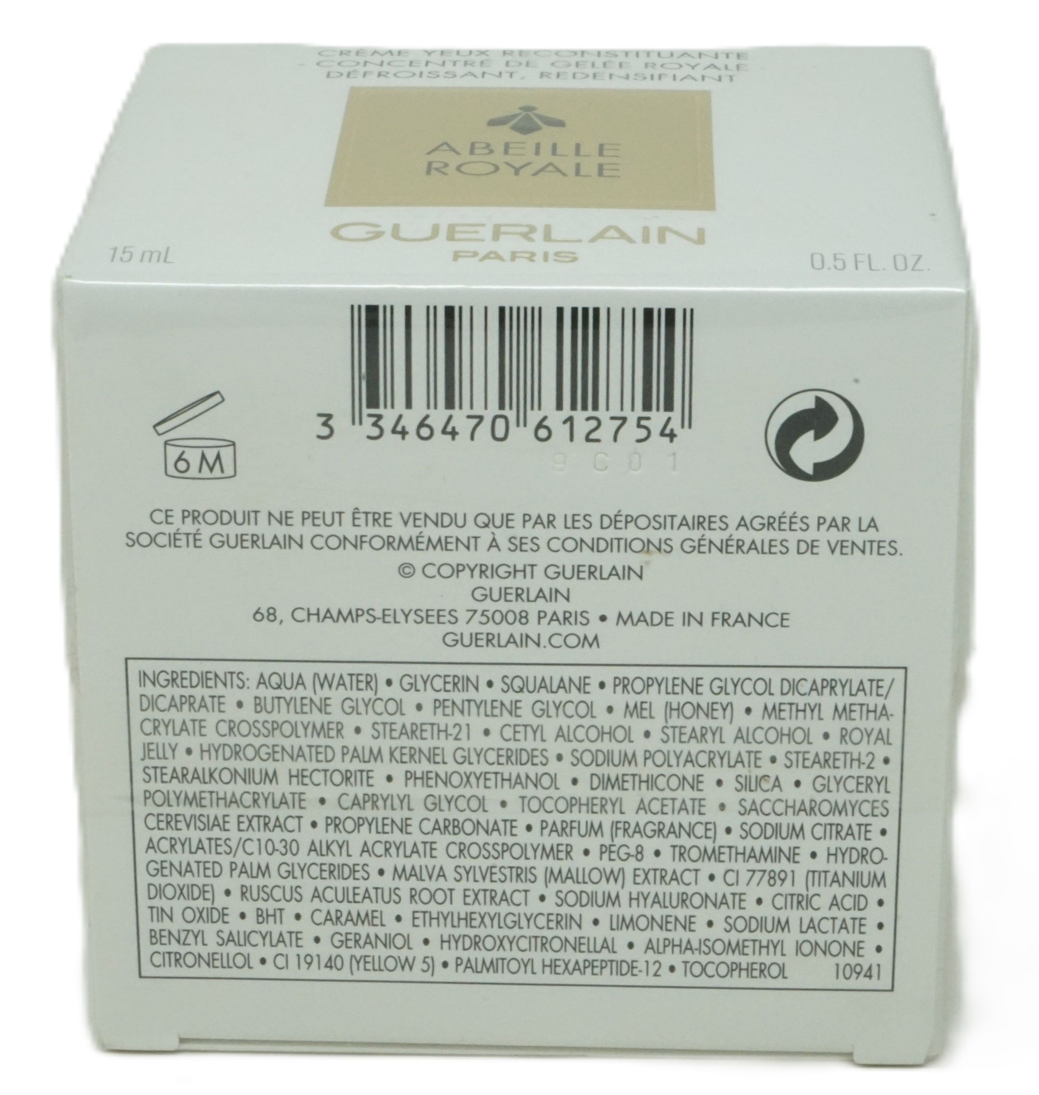 Weiße Verpackung mit Text und Barcode. "Abeille Royale" und "Guerlain Paris" Schriftzug. 15 ml und 0.5 FL. OZ.
