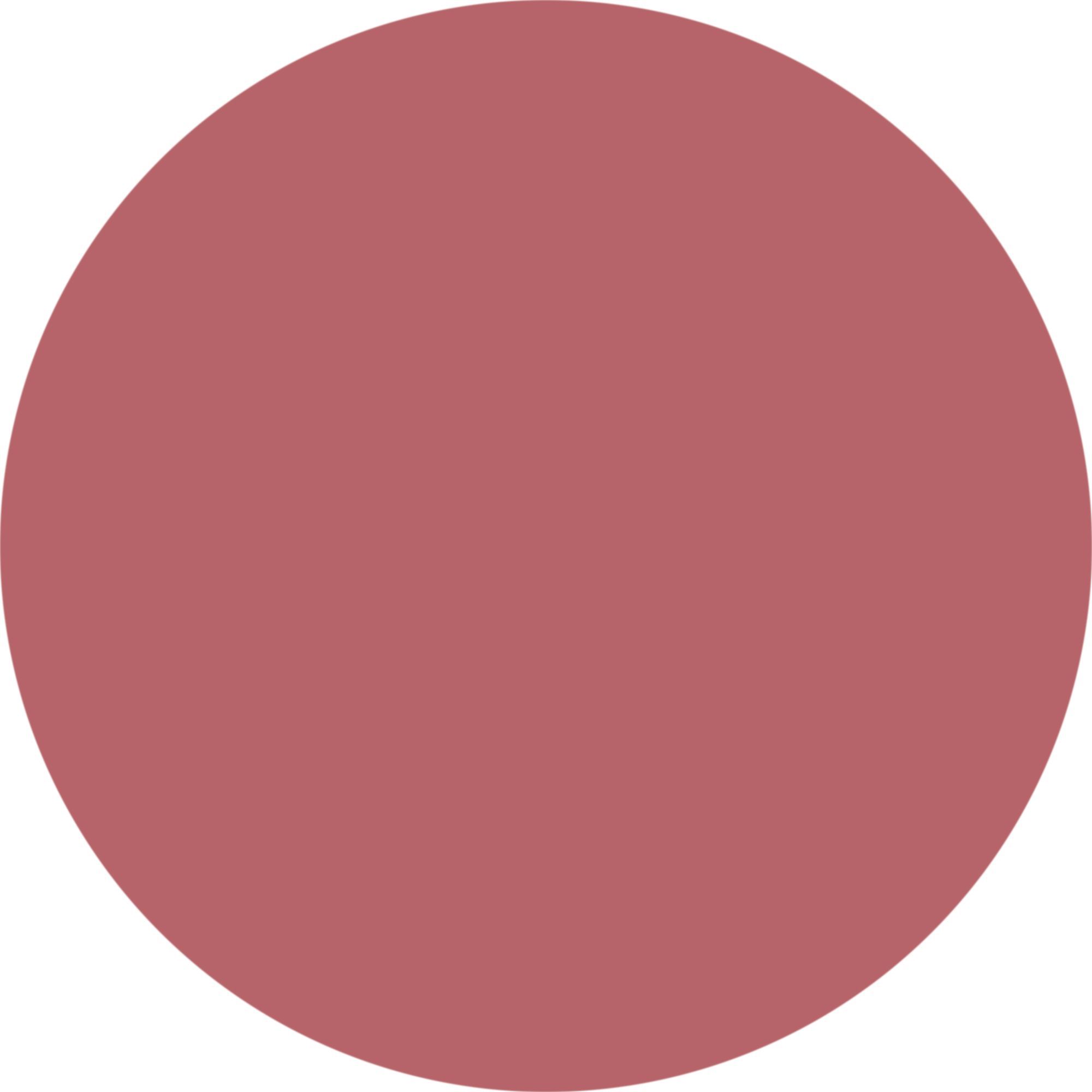 Kreisförmiger Fleck rosafarbenen Lippenstifts.