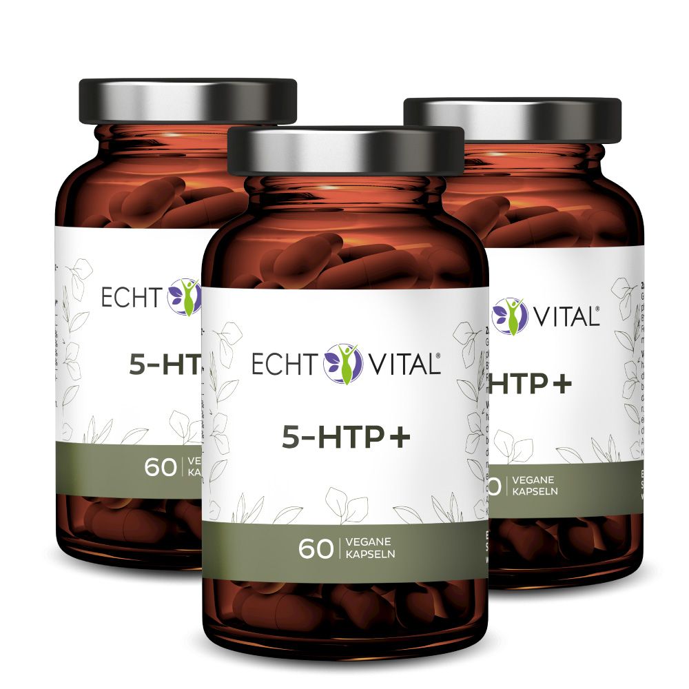 Drei braune Glasflaschen mit silbernen Deckeln. Etiketten mit Aufschrift: Echt Vital 5-HTP+. 60 vegane Kapseln.