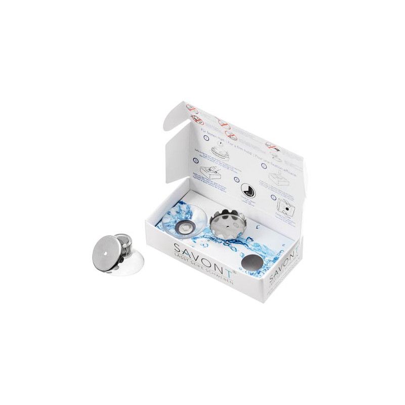 Geöffnete Verpackung mit Seifenhalter-Komponenten. Enthält Halterungen, Magnete und eine Anleitung. Das Produkt ist in einer Box verpackt.