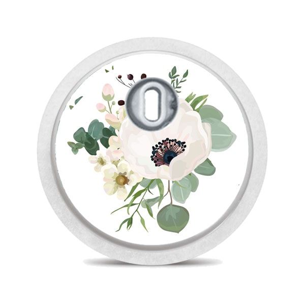 Runder Aufkleber mit floralem Design. Weiße Umrandung, Blumenmuster mit weißen Blüten und Eukalyptusblättern.