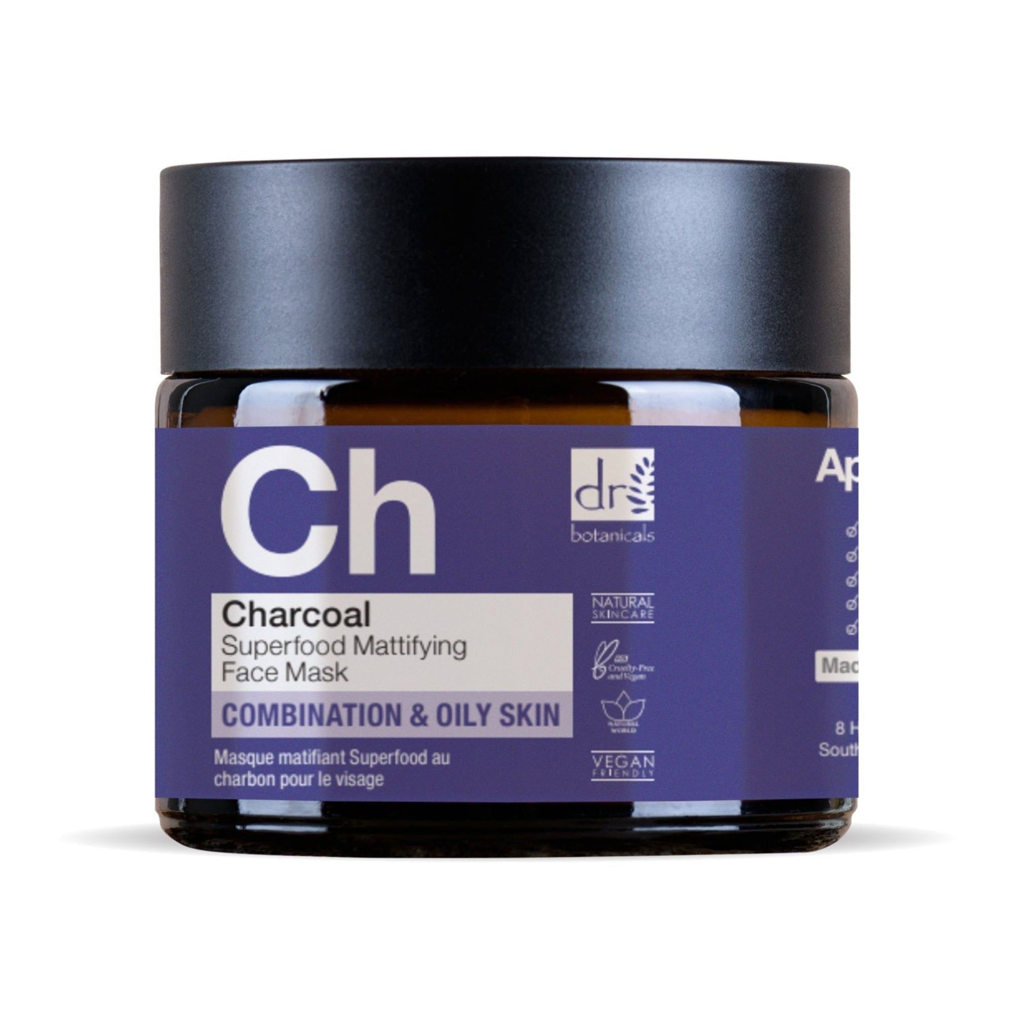 Dunkelbraunes Glas mit schwarzem Deckel. Violettes Etikett mit weißer Schrift: Charcoal Superfood Mattifying Face Mask. Vegan.