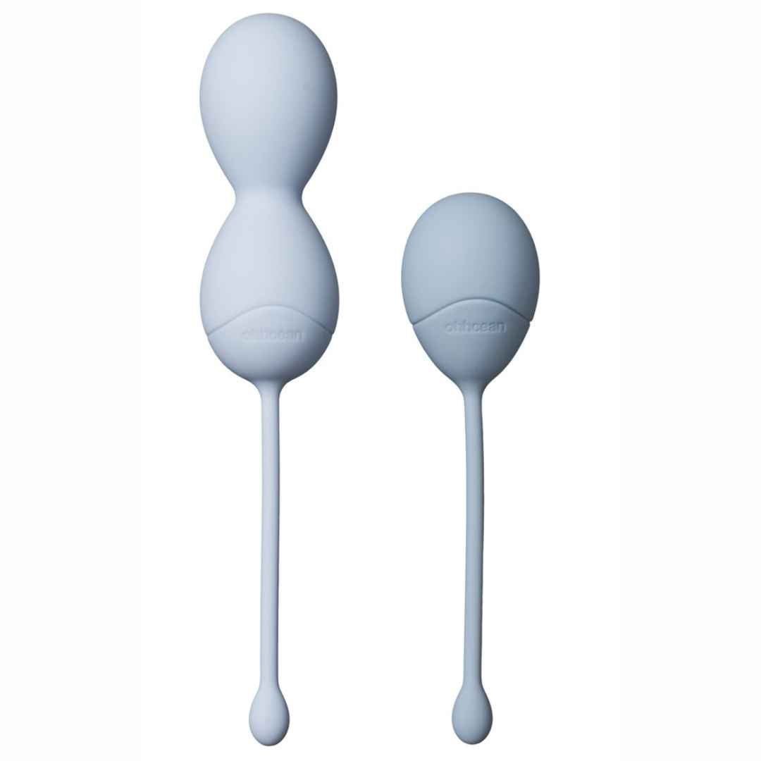 Zwei hellgraue Beckenbodenkugeln mit Stiel. Eine Kugel ist doppelt, die andere einfach. ohhcean-Logo.
