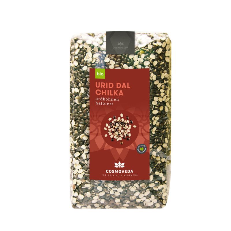 Transparente Verpackung mit Urid Dal Chilka. Rotes Etikett mit Produktbezeichnung und Logo. Bio-Siegel.