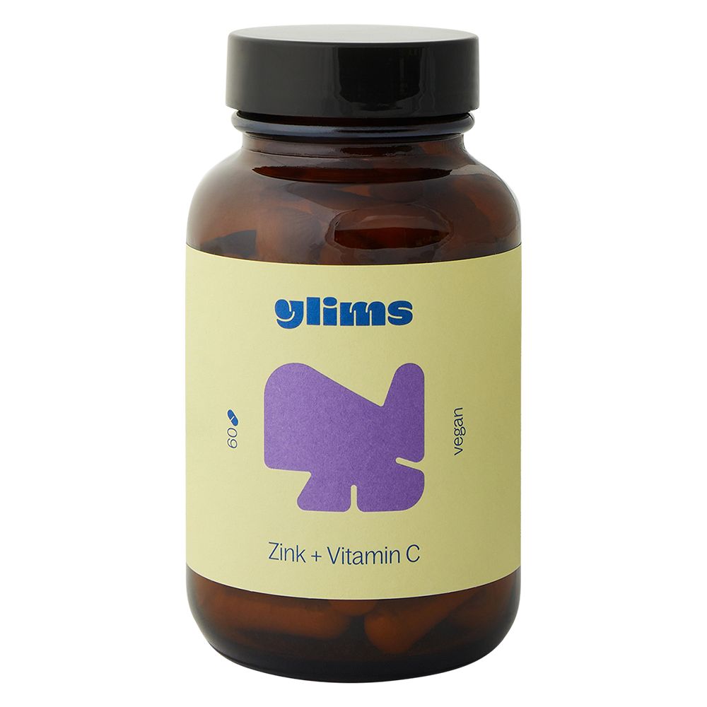 Braune Glasflasche mit schwarzem Deckel. Etikett mit Produktnamen, Logo und vegan-Hinweis. Enthält 60 Kapseln.