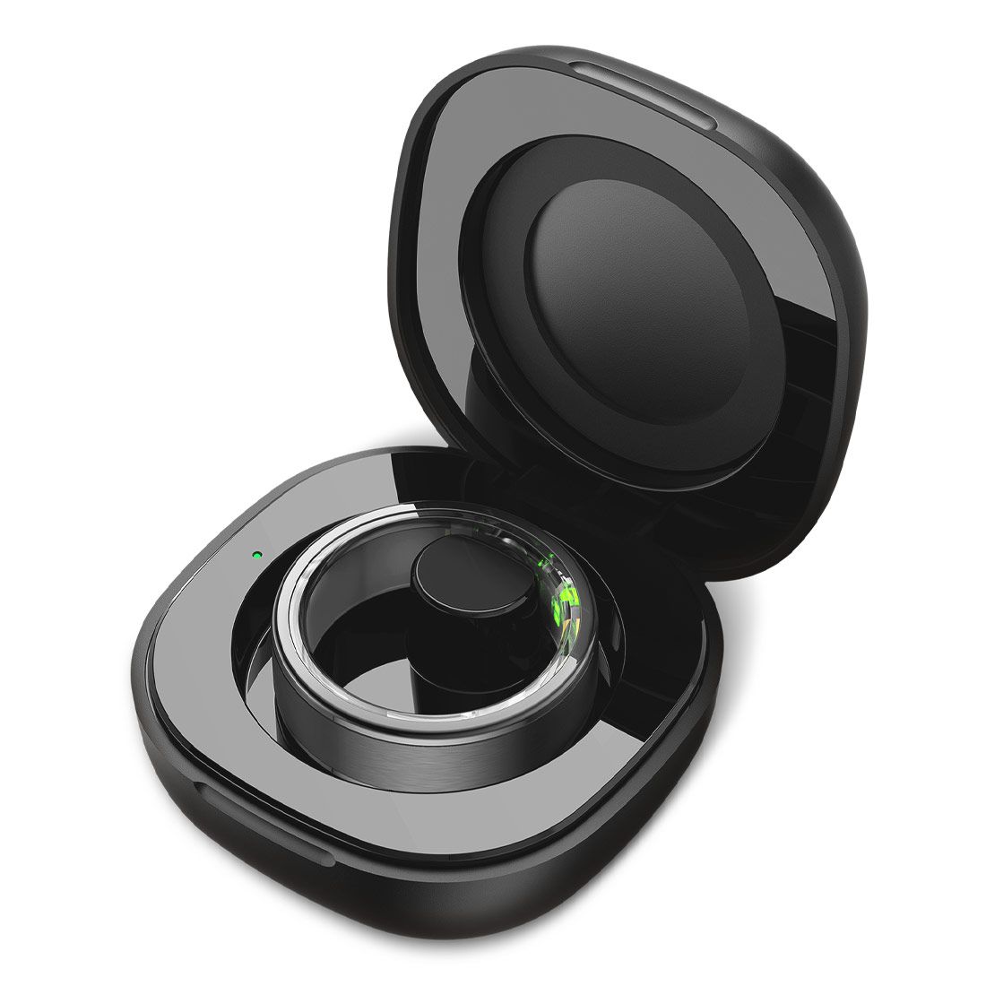 L'anello smart KSIX Saturn in una custodia di ricarica nera. L'anello è nero e lucido, con componenti elettronici visibili. La custodia è aperta, mostrando l'anello all'interno.