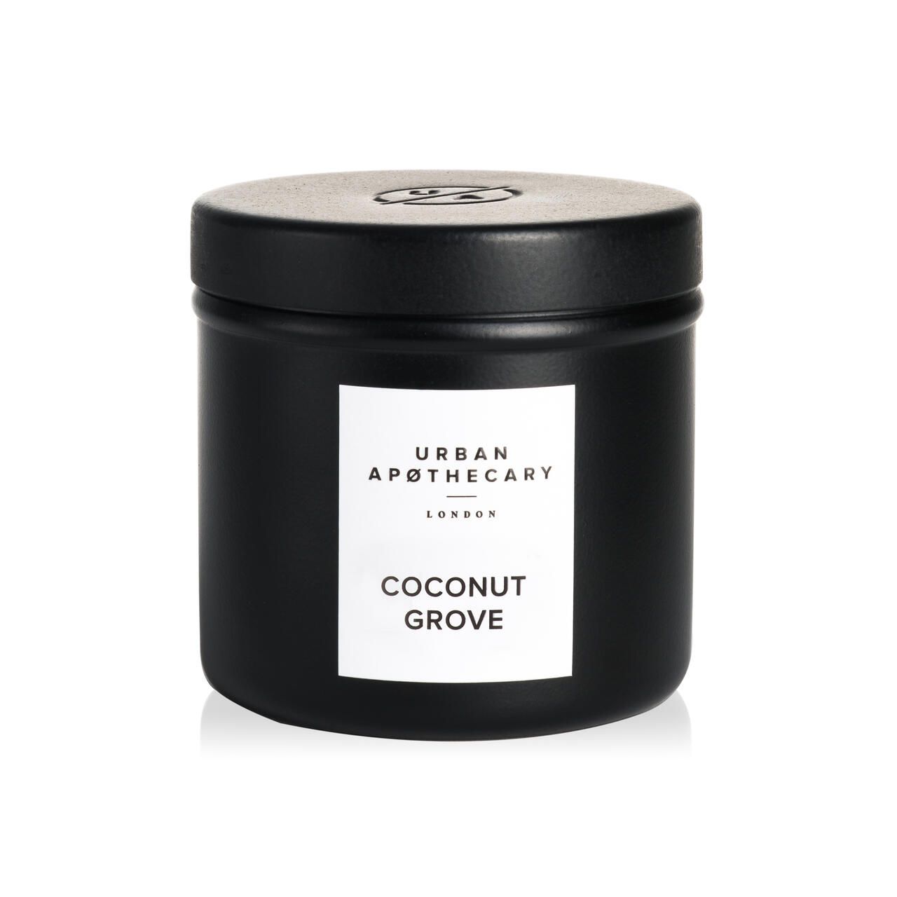 Schwarze Kerze in Dose mit Deckel. Weißes Etikett mit "Urban Apothecary London" und "Coconut Grove".