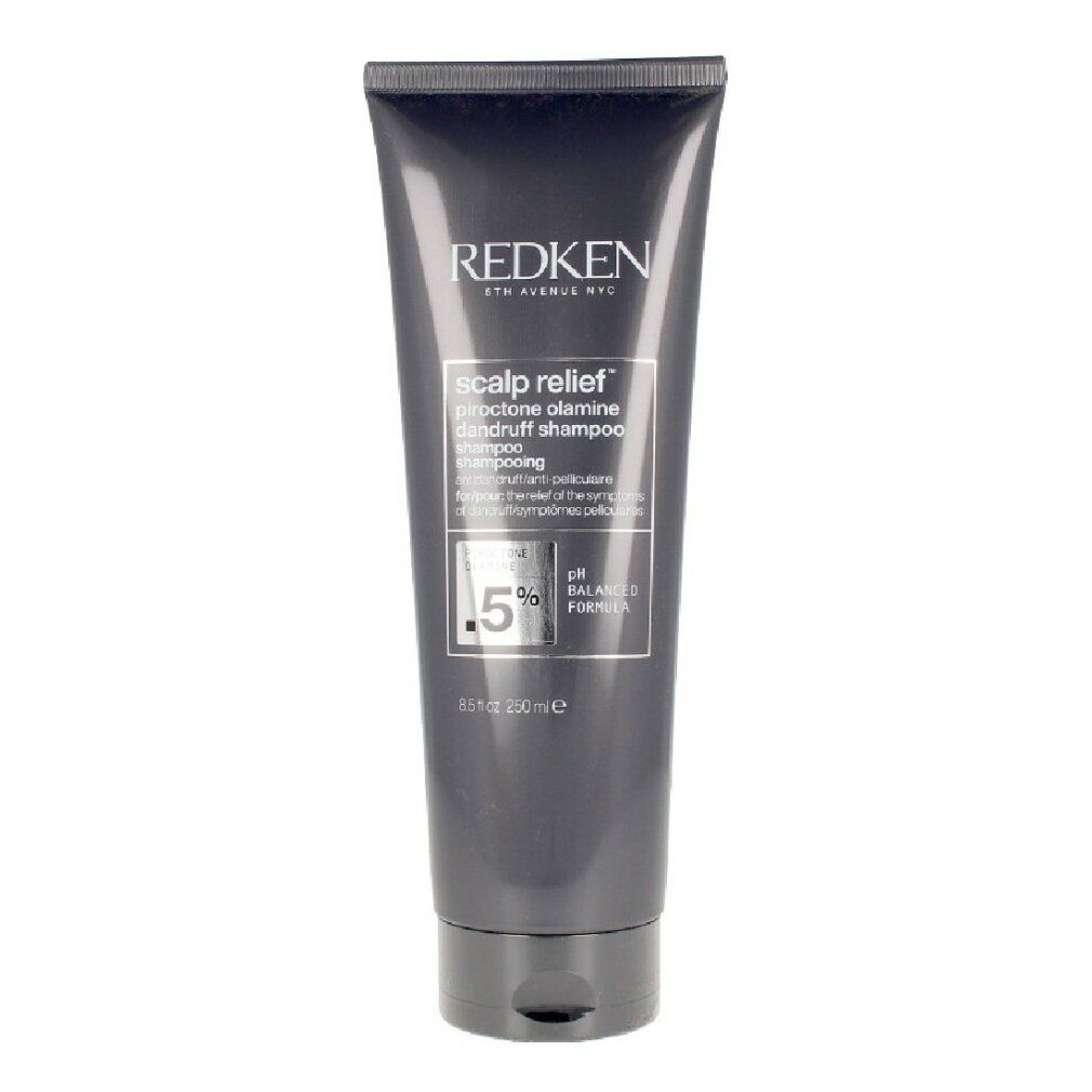 Dunkelgraue Tube. Text: Redken, Scalp Relief, Piroctone Olamine, Anti-Schuppen Shampoo. 0,5% Piroctone Olamine.