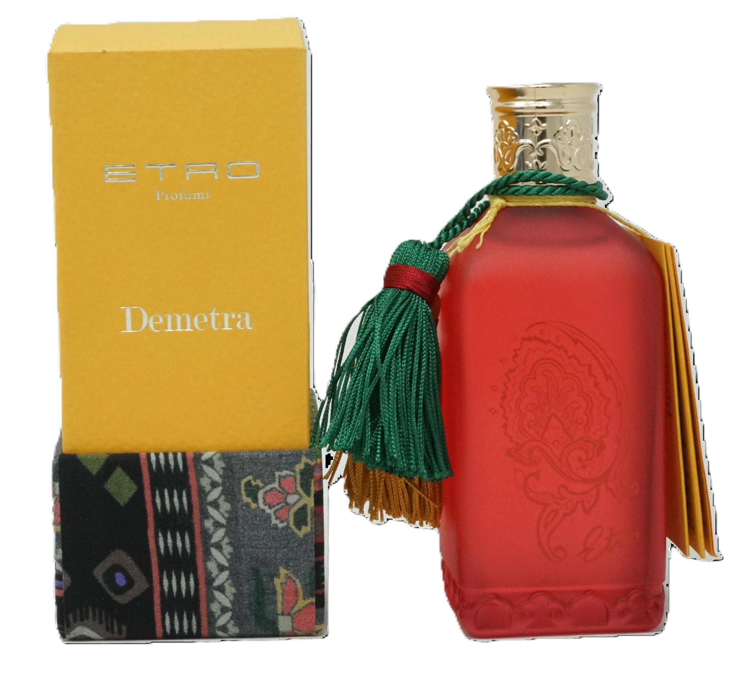 Rote Flasche mit goldfarbenem Deckel und Quaste, neben gelber Schachtel mit 'Etro' und 'Demetra'.