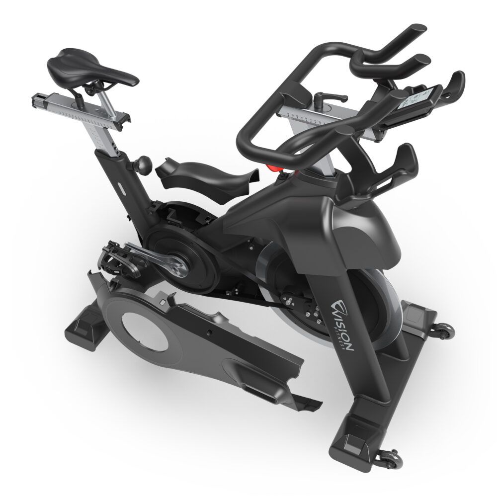 Indoor Cycle mit abgenommenen Abdeckungen. Sichtbar: Rahmen, Schwungrad, Pedale, Sattel, Lenker.