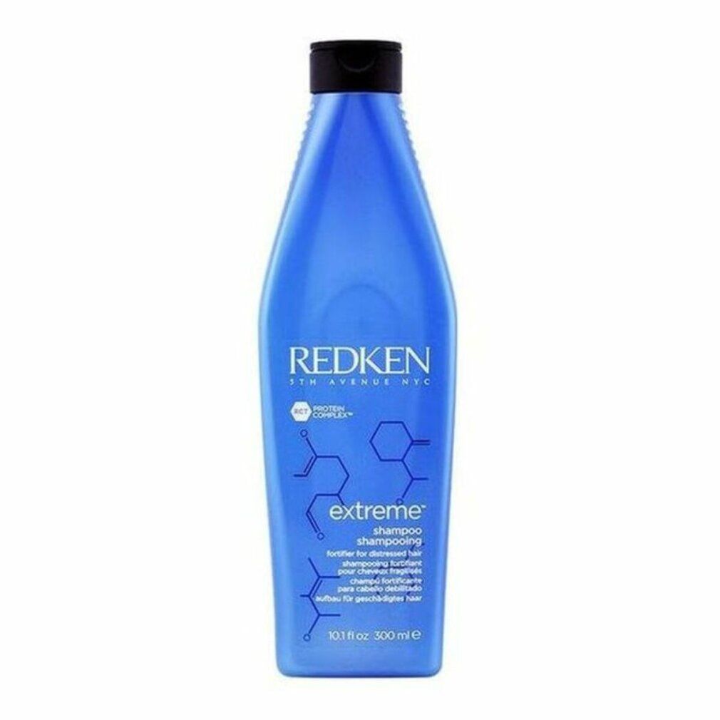 Blaue Shampoo-Flasche mit schwarzem Deckel. Aufschrift: Redken, Extreme Shampoo. Enthält Protein Complex. 10.1 fl oz.