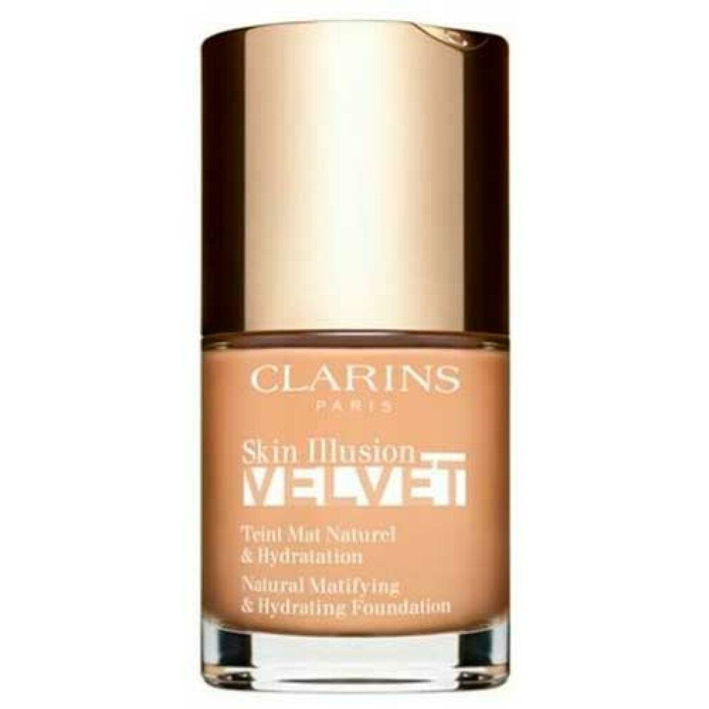 Clarins Skin Illusion Velvet Foundation in hellem Beige mit goldenem Deckel.