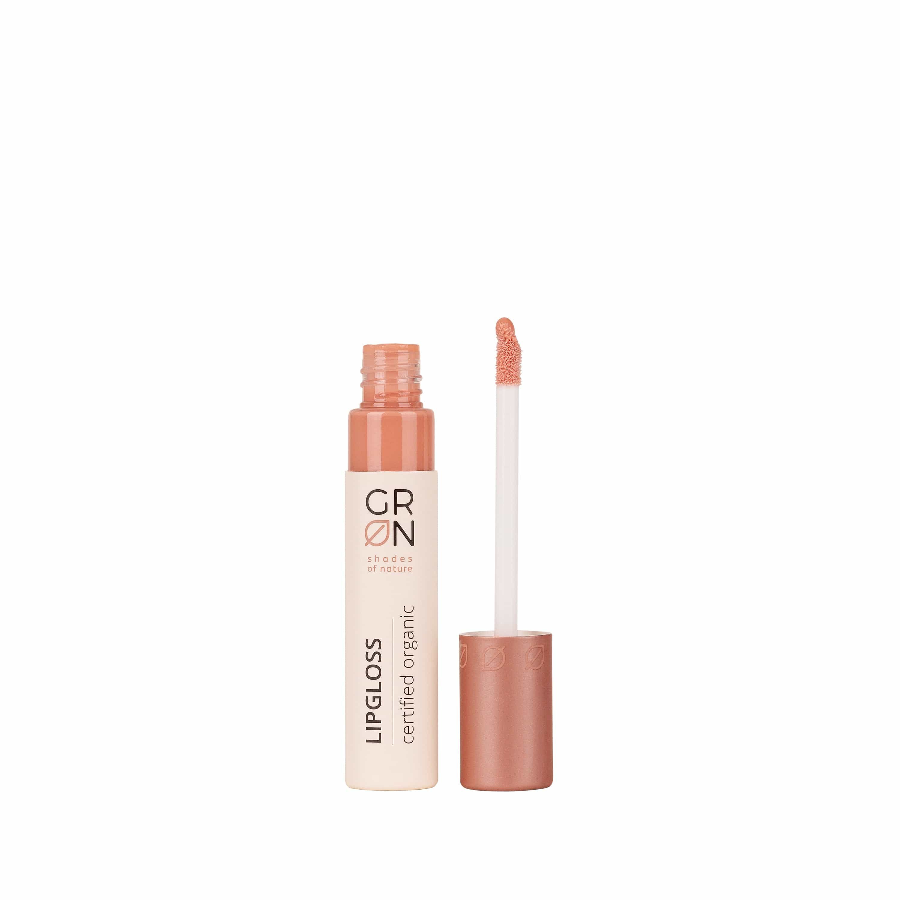 GRN Lipgloss, geöffnet. Flasche und Applikator in Rosa- und Beigetönen. Aufschrift: LIPGLOSS, certified organic.