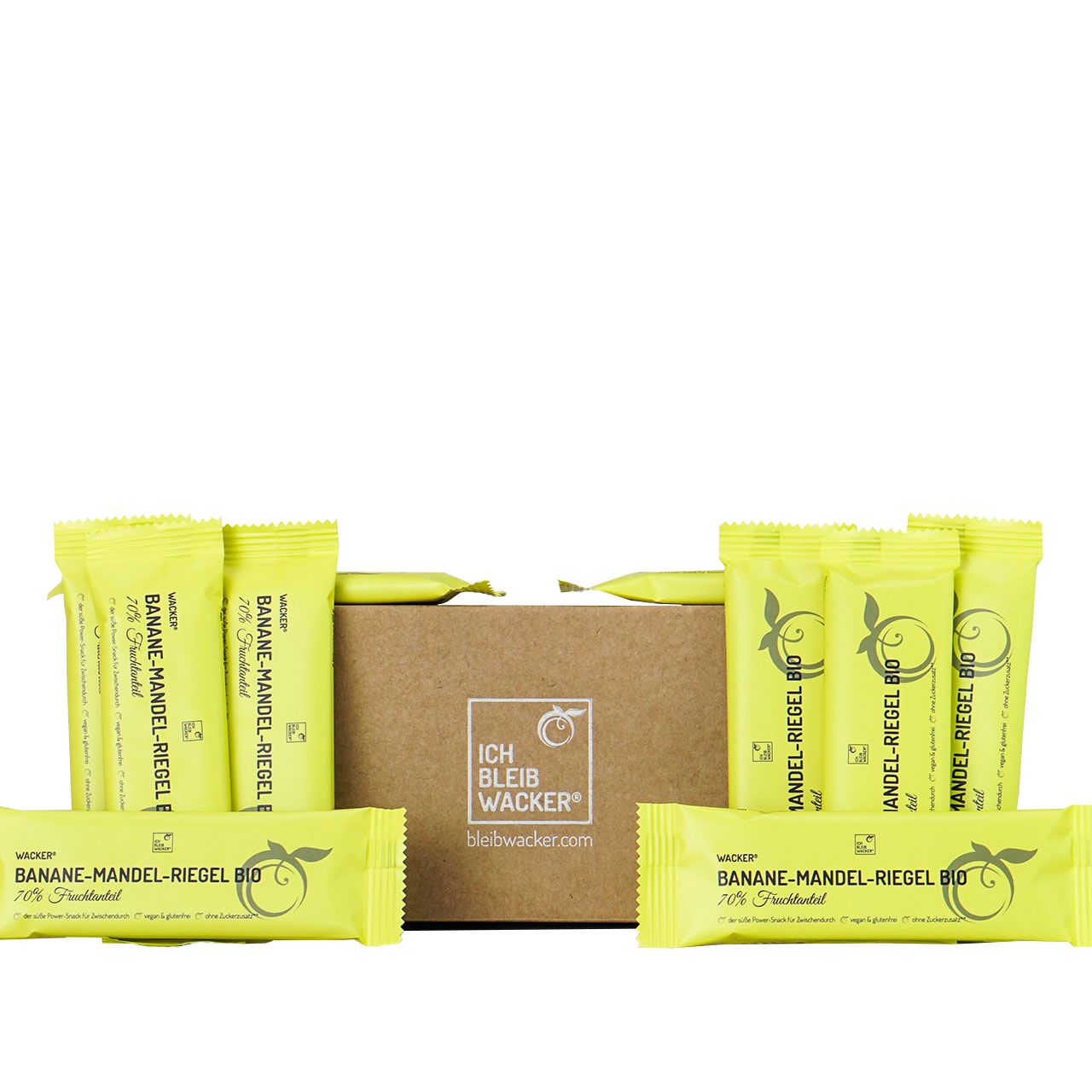 10er-Paket Banane-Mandel-Riegel Bio. Einzeln verpackte Riegel in gelber Folie, Karton mit Logo.