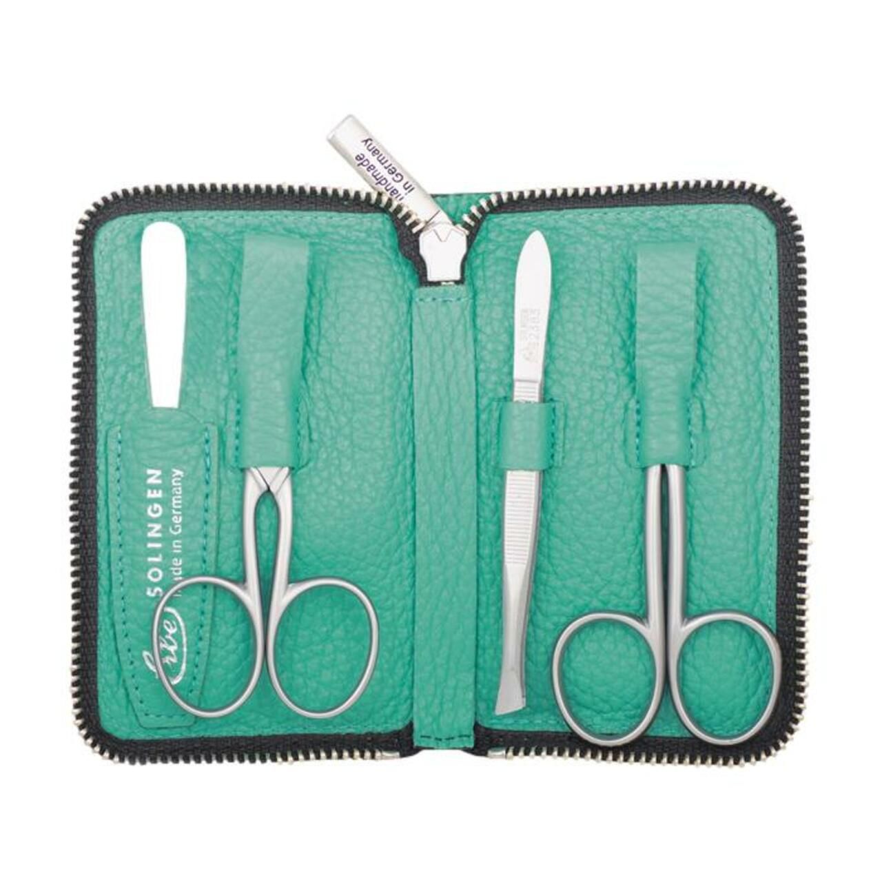 Hellgrünes Etui mit Reißverschluss, gefüllt mit Nagelscheren, Pinzette und Feile. Aufschrift: Solingen, Erbe, Made in Germany.
