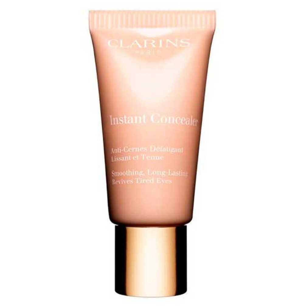 Clarins Instant Concealer Tube. Beige-gelbe Farbnuance. Text auf dem Tube: Instant Concealer, Anti-Cernes Défatigant, Lissant et Tenu.