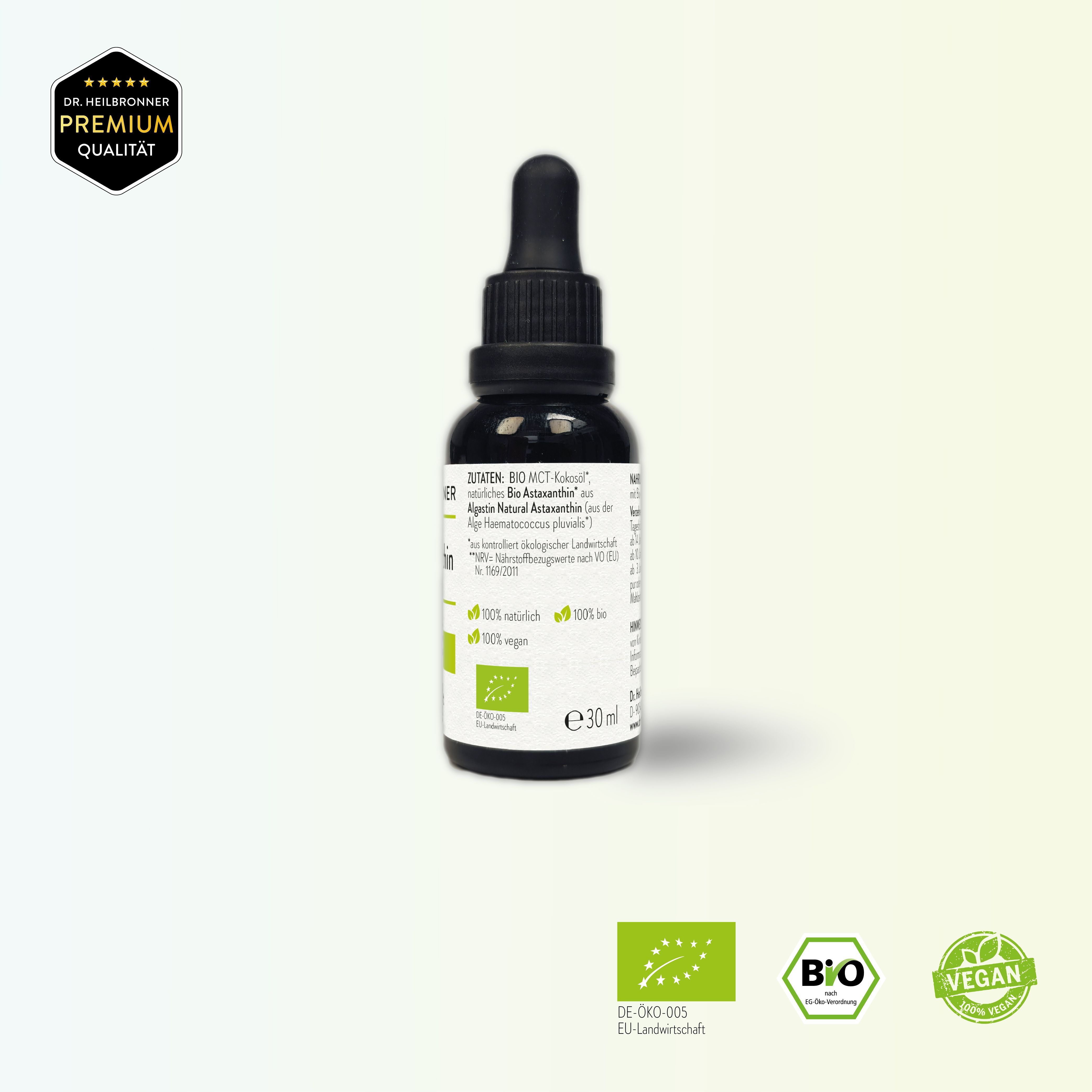 Braune Glasflasche mit schwarzem Tropfer. Beschriftung: Bio Astaxanthin Liquid, 30 ml. Bio-Siegel, Vegan-Siegel. Premium Qualität.