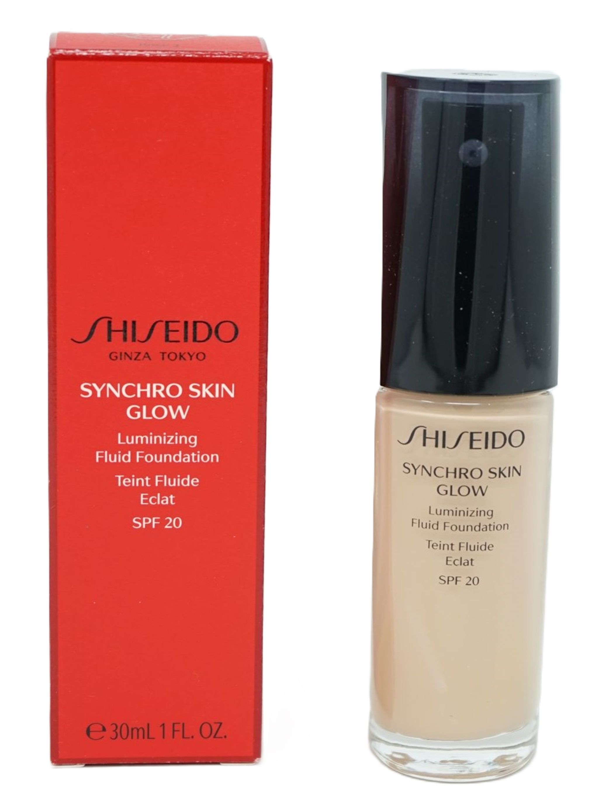 Eine Flasche und eine rote Schachtel. Auf der Flasche und der Schachtel steht "SHISEIDO SYNCHRO SKIN GLOW Luminizing Fluid Foundation SPF 20".