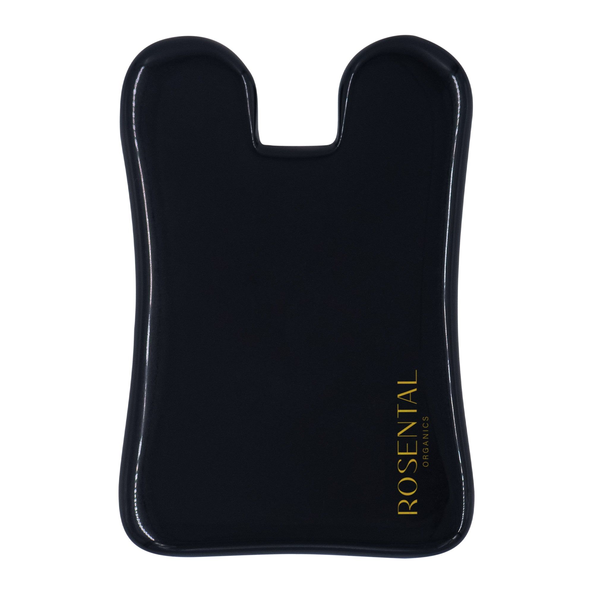 Schwarzes Gua Sha aus Obsidian. U-förmig mit abgerundeten Kanten. Goldener Schriftzug: ROSENTAL ORGANICS.