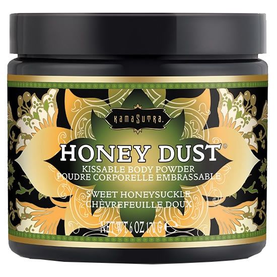 Dose mit Honigpuder. Aufschrift: Honey Dust, Kissable Body Powder, Sweet Honeysuckle. Schwarzer Deckel, goldfarbene und grüne Verzierungen.
