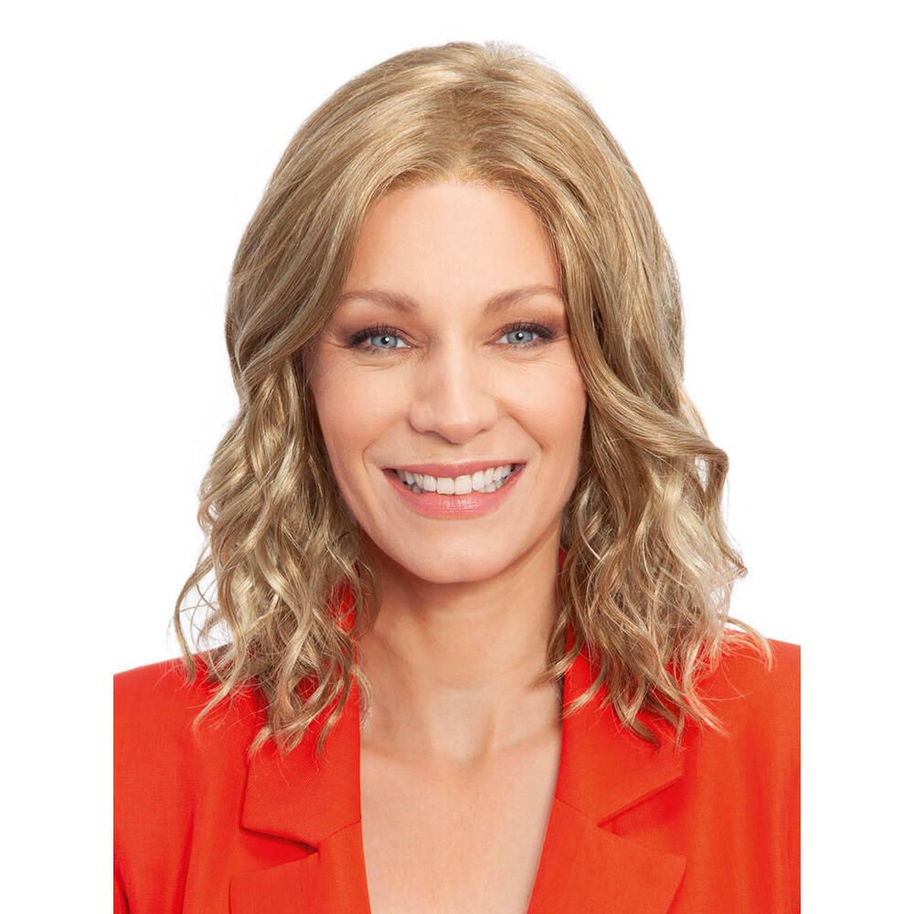 Blonde Perücke mit gewelltem Haar. Frau mit rotem Blazer. Frontansicht.