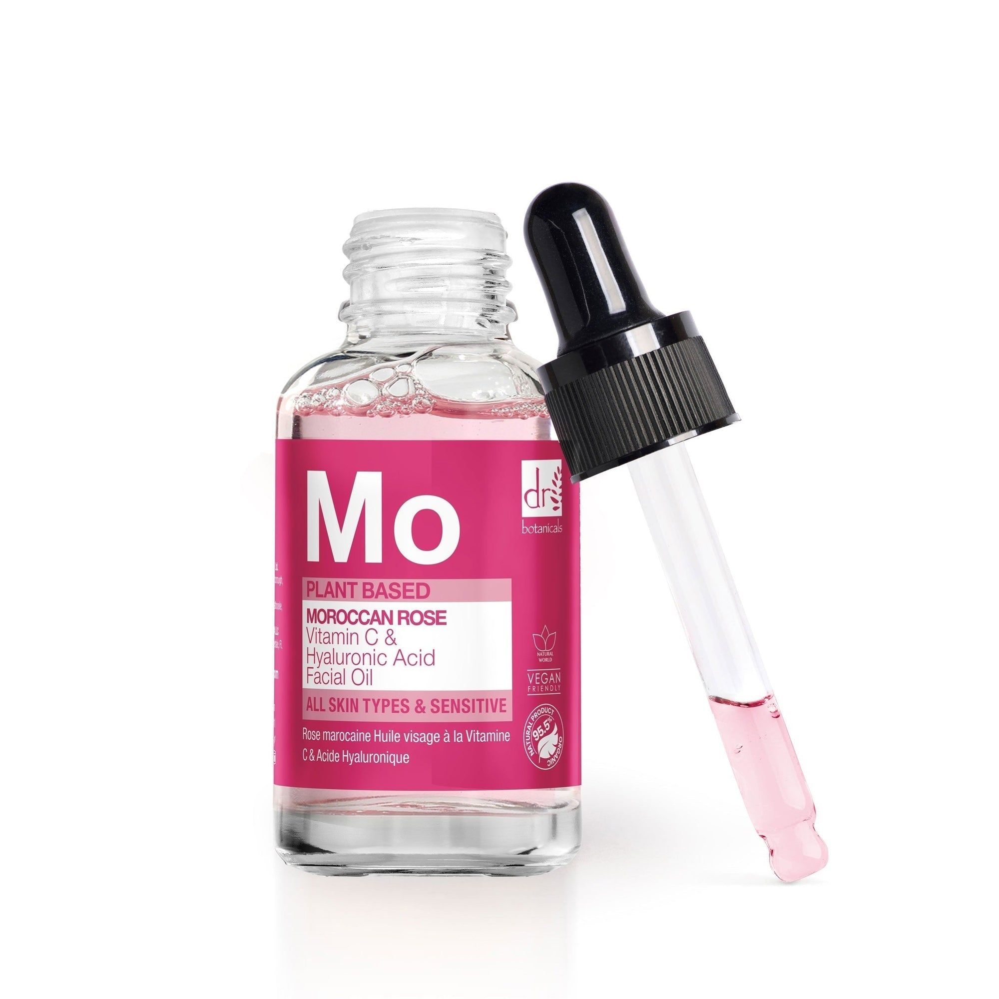 Glasflasche mit Serum und Pipette. Aufschrift: Moroccan Rose. Vegan-Siegel.