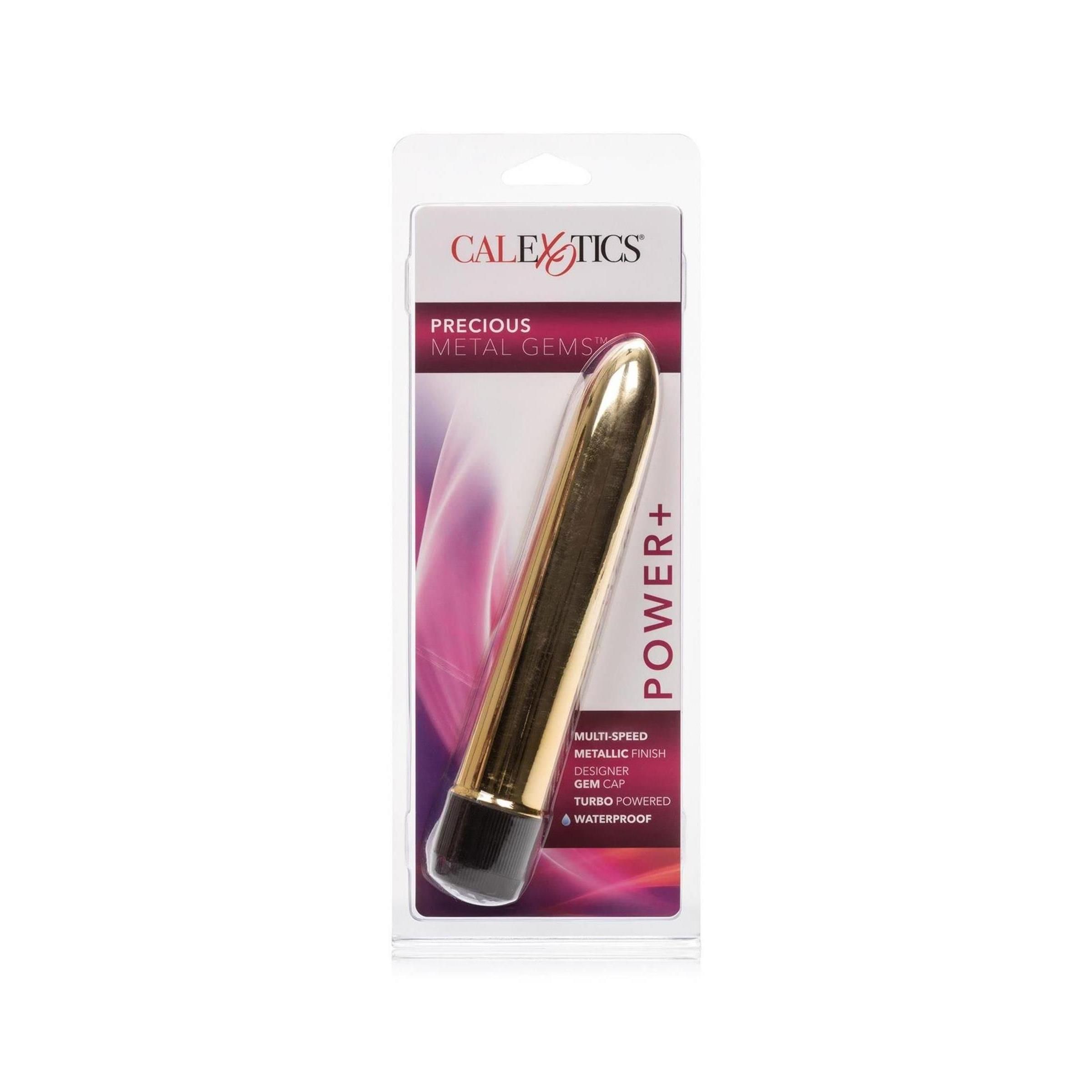Goldfarbener Vibrator in Blisterverpackung. Schwarzer Endbereich. Aufschrift: CalExotics, Precious Metal Gems, Power+.