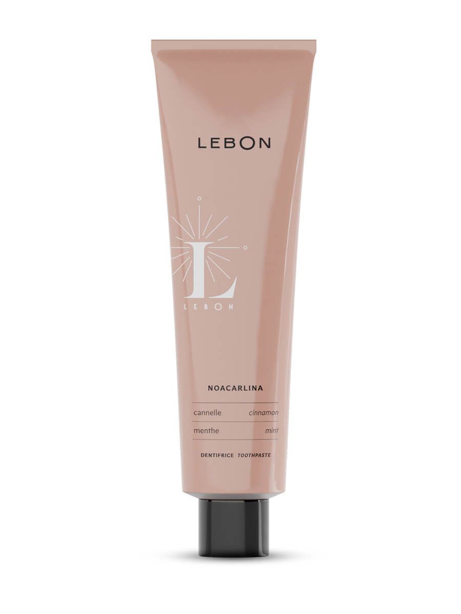 Zahnpasta-Tube LEBON NOACARLINA. Rosa Tube mit schwarzem Verschluss. Aufschrift LEBON und Produktname.