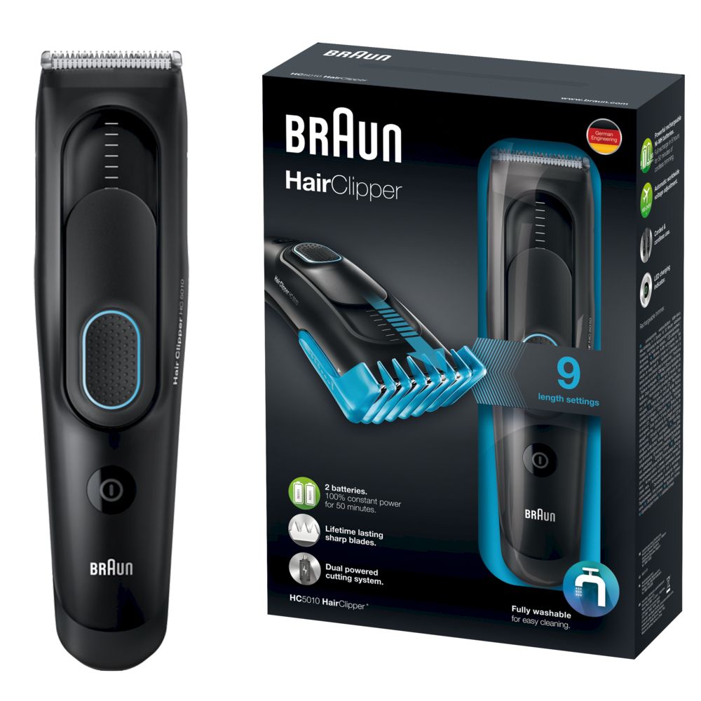 Schwarzer Haarschneider mit Verpackung. Auf der Verpackung: Braun, HairClipper, 9 Längeneinstellungen, 2 Batterien, langlebige Klingen.