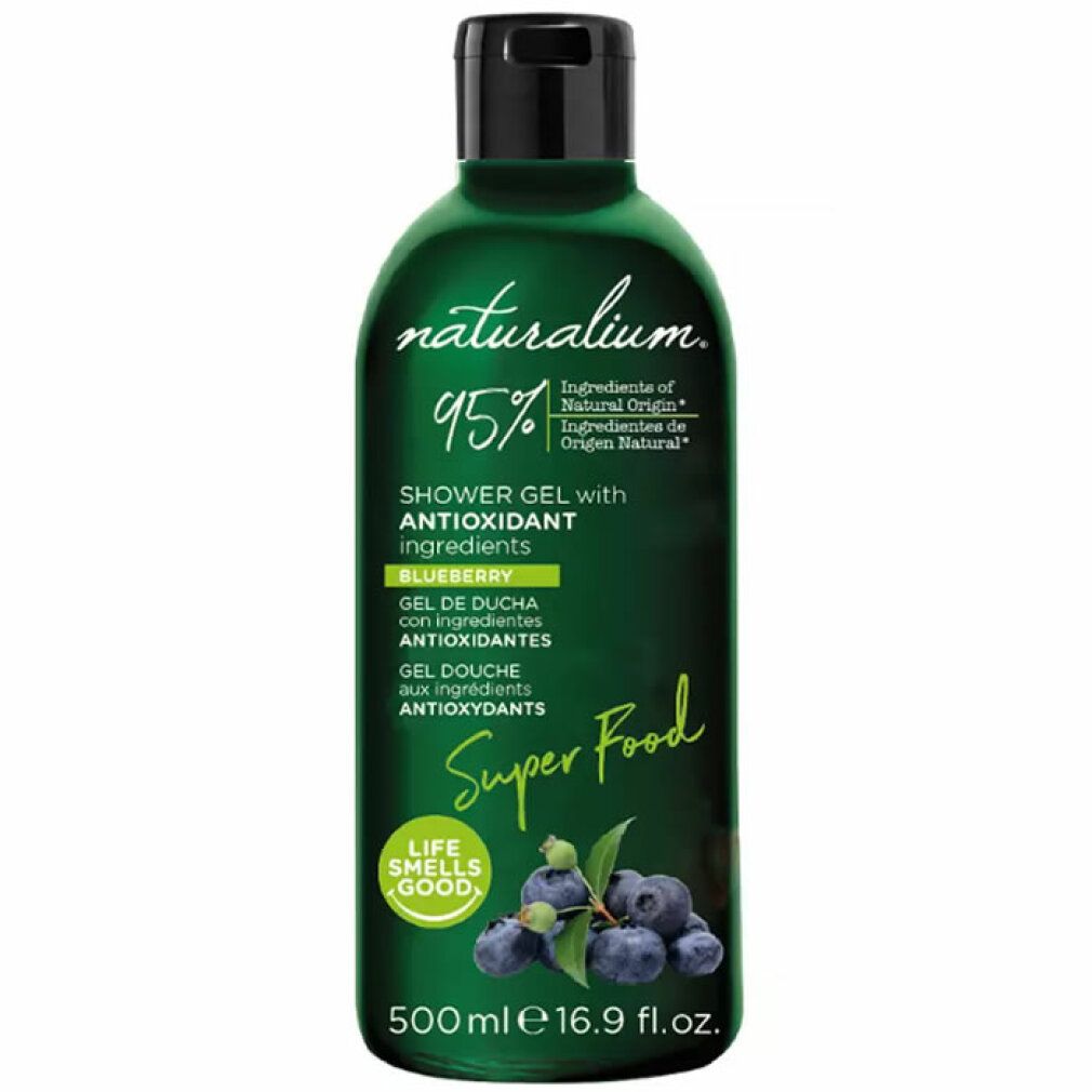 Grüne Flasche mit schwarzem Deckel. Aufschrift: Naturalium, Shower Gel with Antioxidant ingredients. Abbildung von Blaubeeren.