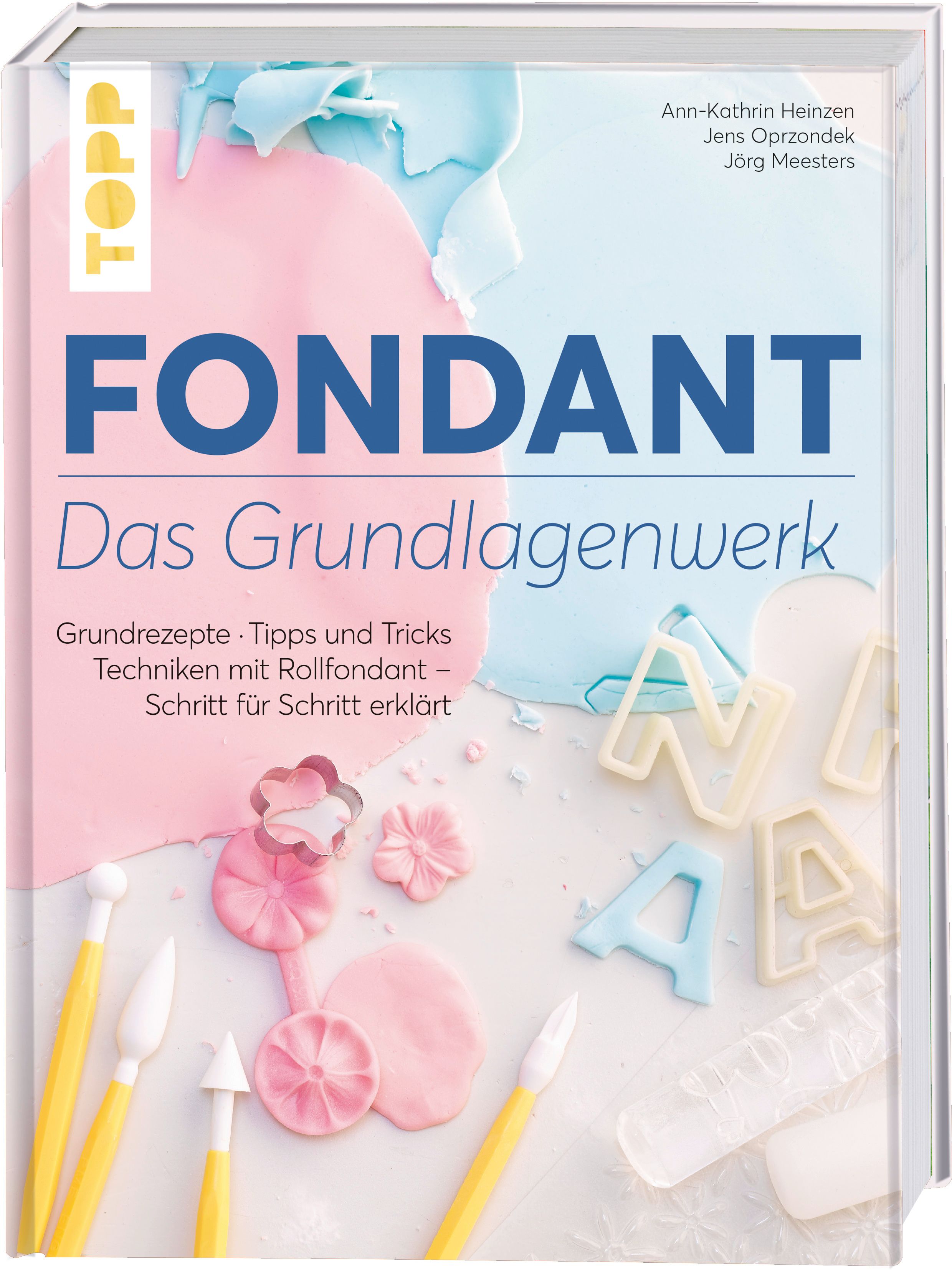 Buch mit dem Titel "FONDANT Das Grundlagenwerk". Auf dem Cover sind Fondant-Dekorationen und Werkzeuge abgebildet.