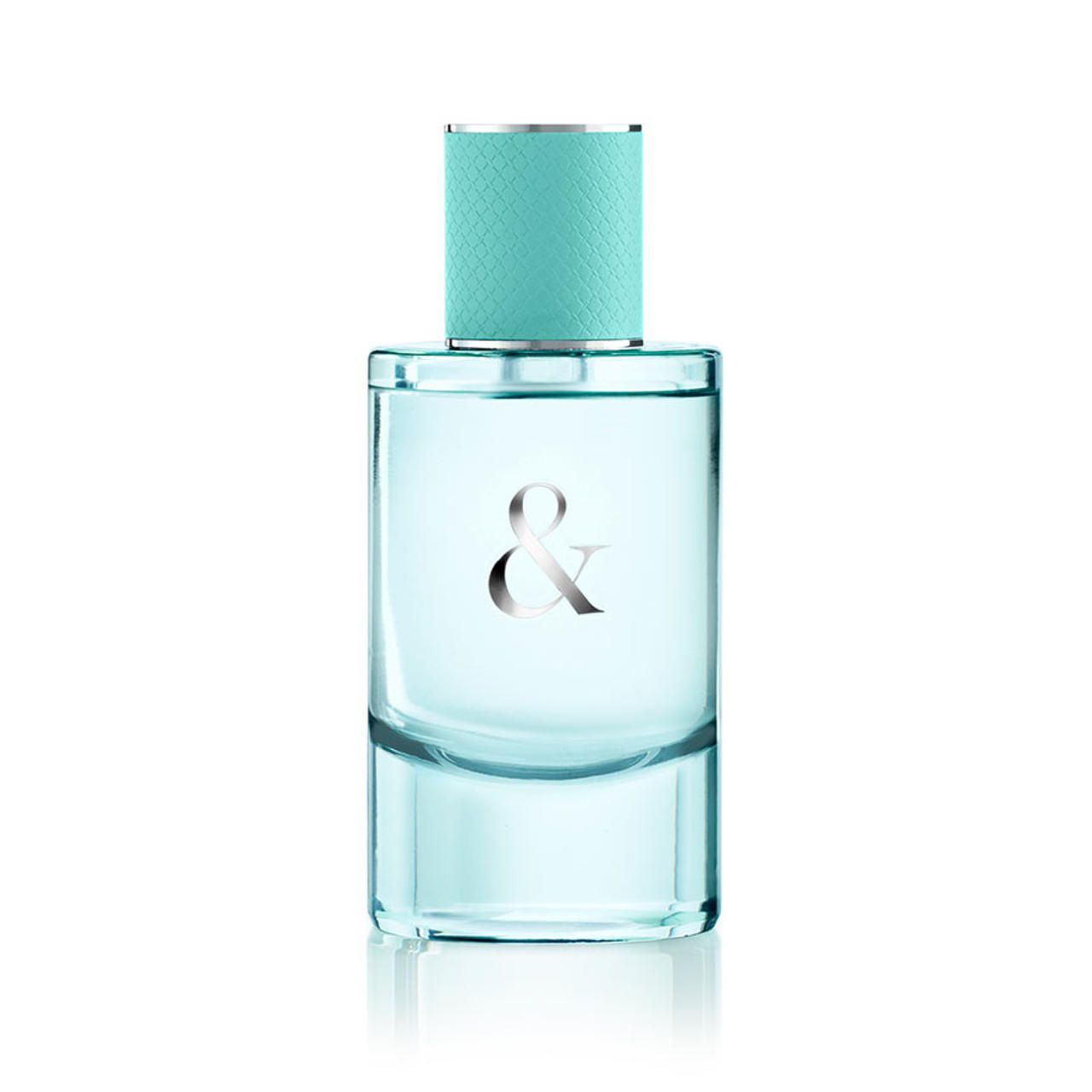 Tiffany & Co. Love Eau de Parfum Flakon. Transparente Flasche mit silbernem & und türkisfarbenem Verschluss.