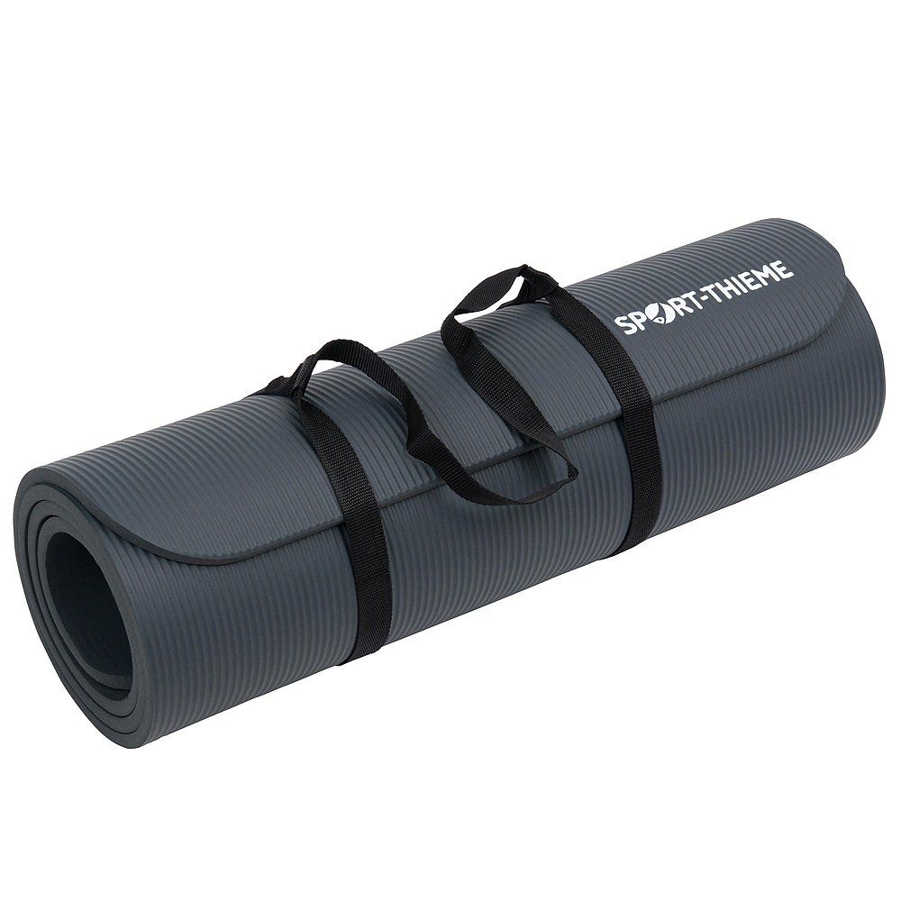 Gerollte graue Fitnessmatte mit Tragegurten. Sport-Thieme Logo sichtbar.