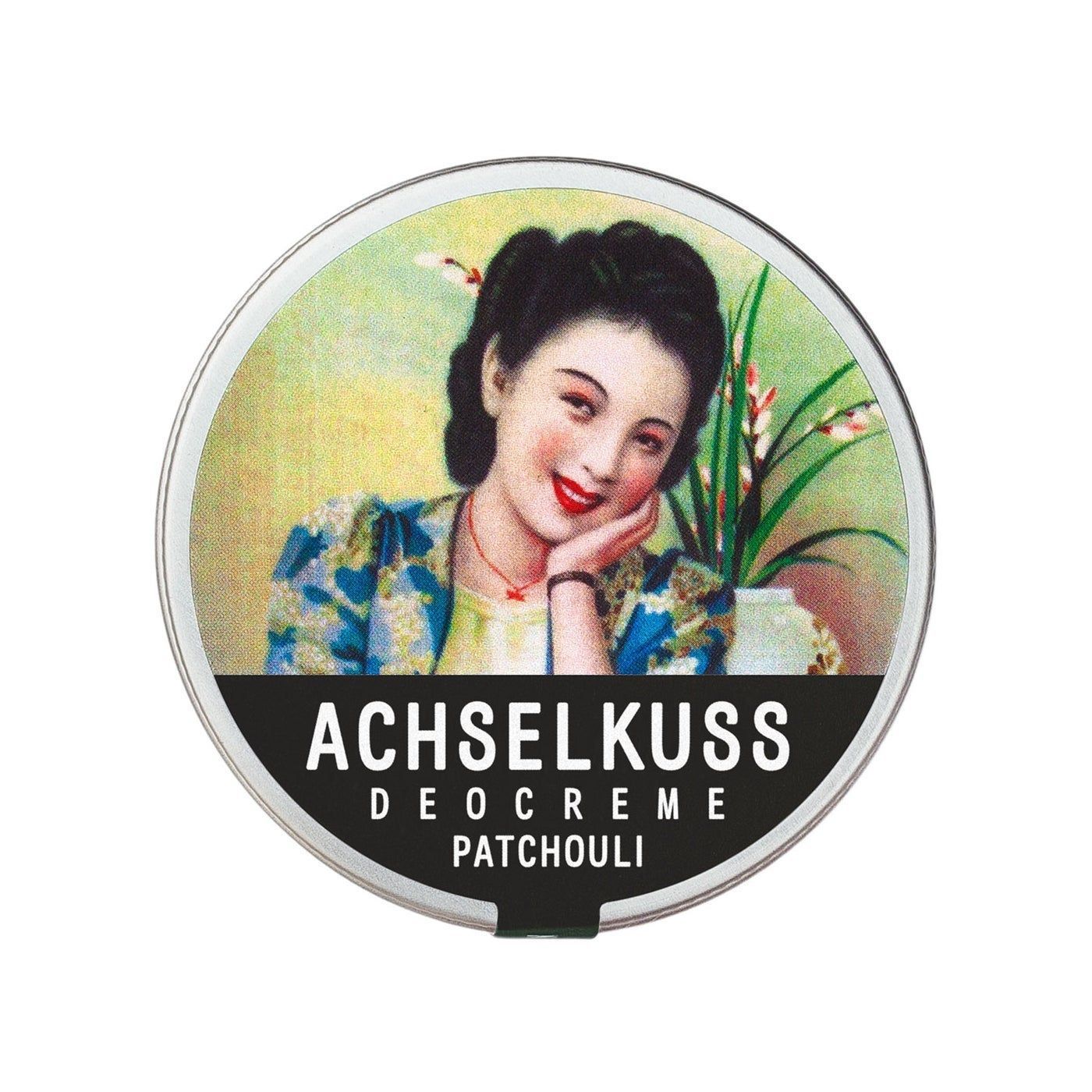 Runde Dose mit Deckel. Auf dem Deckel ein Bild einer Frau. Darunter steht "ACHSELKUSS DEOCREME Patchouli".