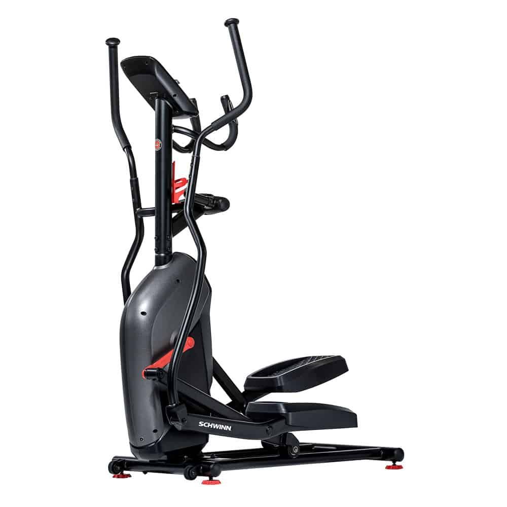 Ellipsentrainer, grau-schwarz mit roten Akzenten. Griffe, Pedale und Konsole. Marke: Schwinn.