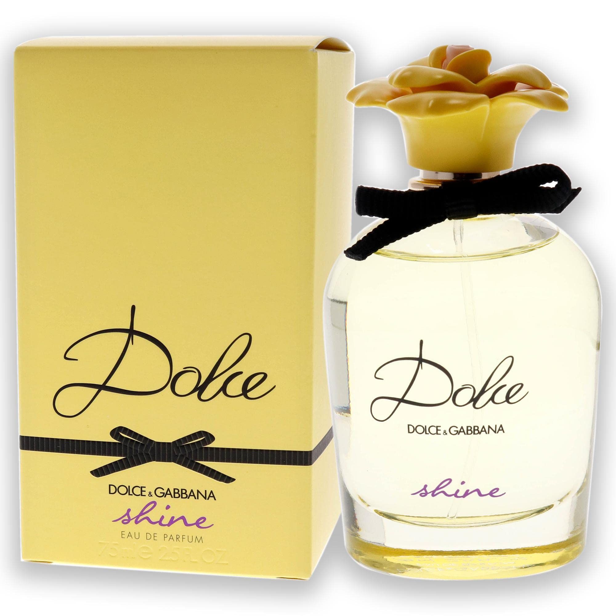 Parfümflakon und gelbe Verpackung. Flakon mit Blütenverschluss, Schleife und "Dolce"-Schriftzug.